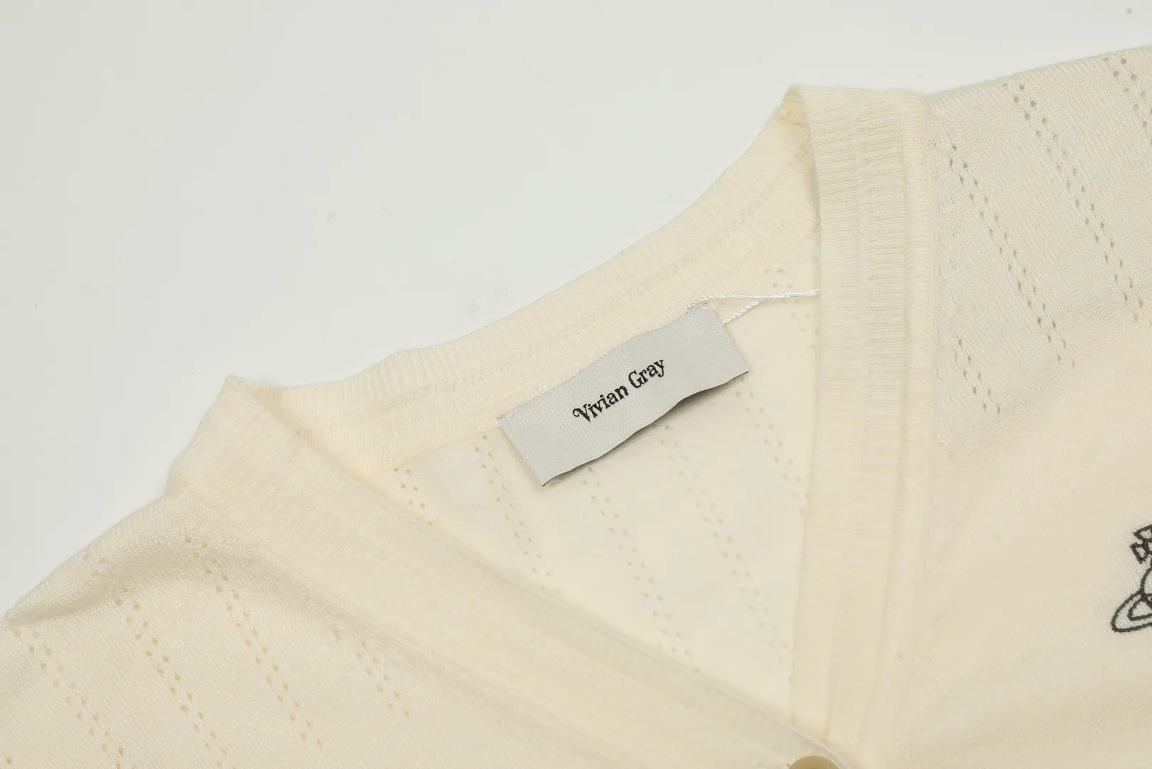 vivienne west wood West Queen Vivian Saturn New Retro "Unisex" Hollow Design Knitted Sweater Wool Round Neck 2024 Spring Latest Style Size: S -M- L Color: Apricot Navy